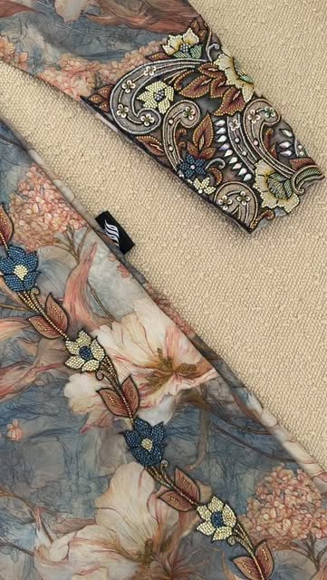 Close view of floral embroidery and beadwork